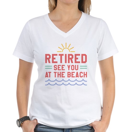 White t-shirt with cute beach design that reads Retired See You at the Beach