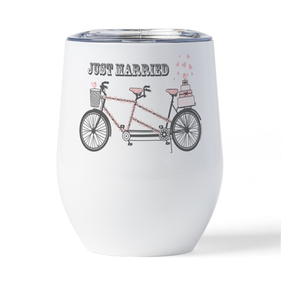 White wine tumbler with cute illustration of bicycle with cake on the end and text that reads Just Married