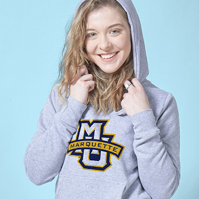 College student wearing her officially licensed Collegiate hooded sweatshirt from CafePress.