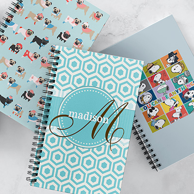 Assortment of notebooks, perfect for the start of a new school year.