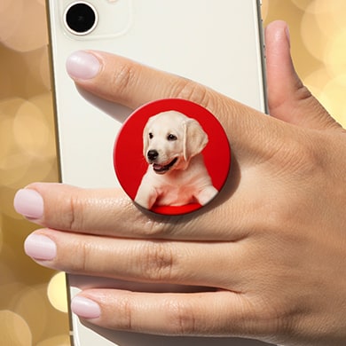 Phone with custom printed Pop Grip® with print of a puppy.