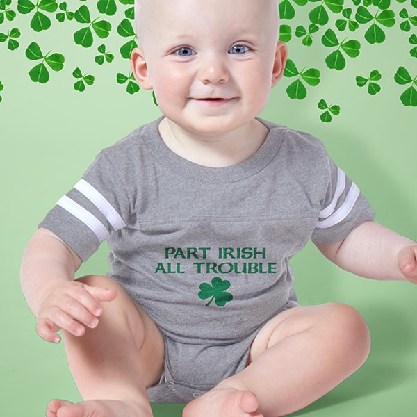 A cute baby wearing a baby bodysuit with an officially licensed PEANUTS(R) design