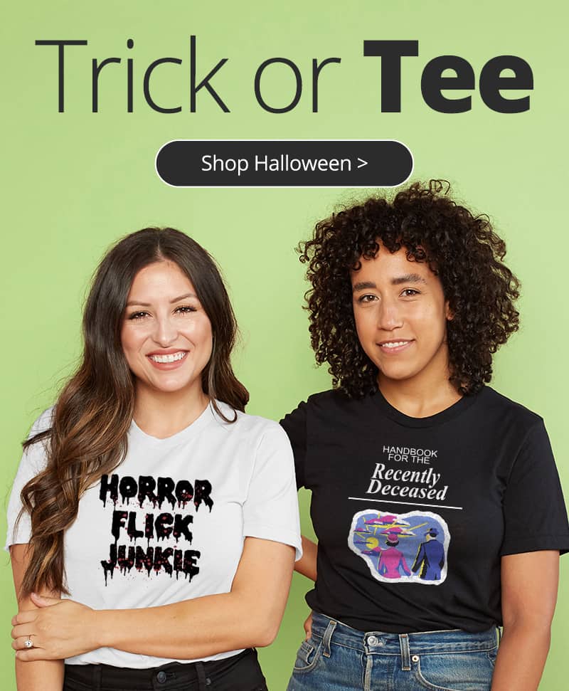 Trick or Tee. Shop Halloween T-Shirts. Two women wearing custom design t-shirts. One has a Beetlejuice design and the other has a Rocky Horror Picture Show design.