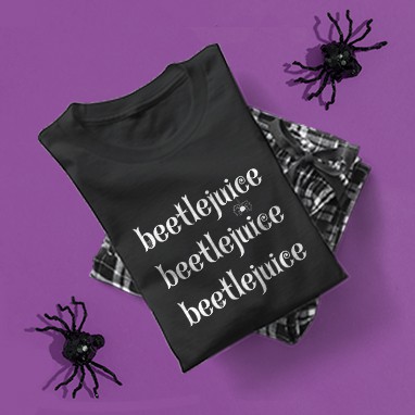 Pajamas set with custom printed official licensed Beetlejuice movie Halloween design showing stylized text that reads: Beetlejuice, Beetlejuice, Beetlejuice.