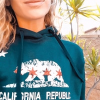 Female wearing a California Republic custom printed hoodie.