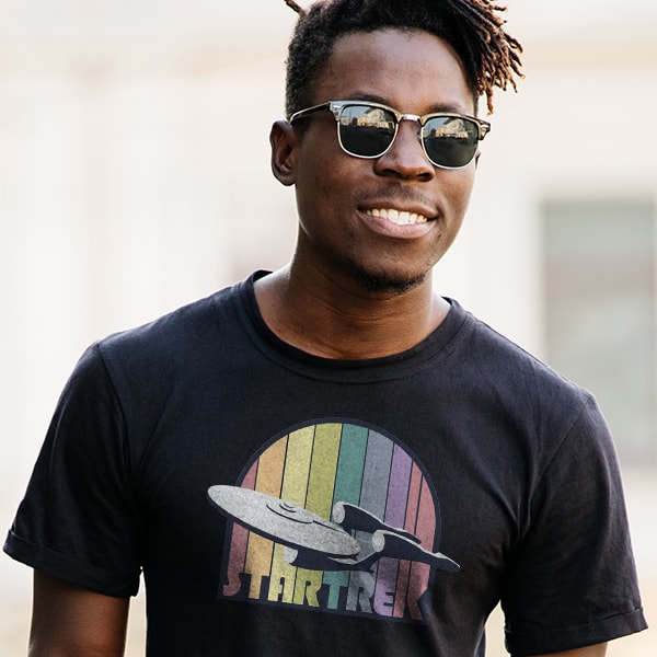 A retro style teeshirt printed with a Star Trek logo.