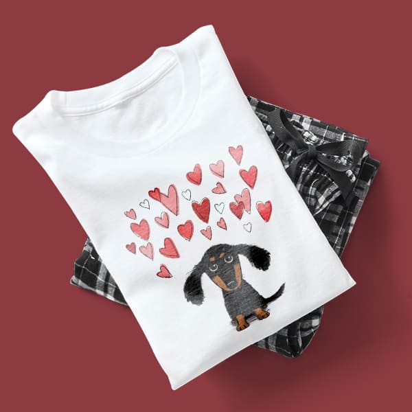 Cute puppy illustration with hearts above his head design on a pajama set t-shirt.