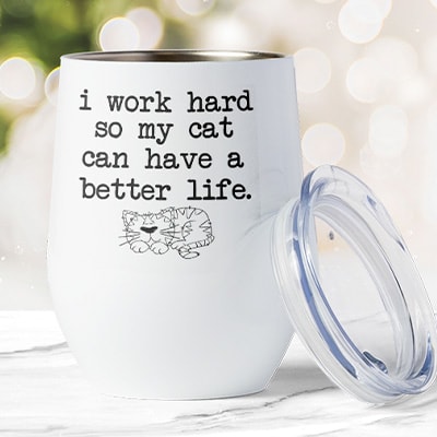 Wine mug with custom design showing a cat line-art illustration and stylized text that reads: I Work Hard So My Cat Can Have a Better Life.