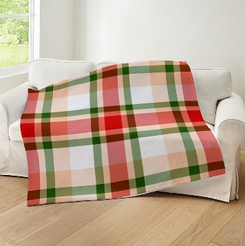 Striped blanket on a sofa.