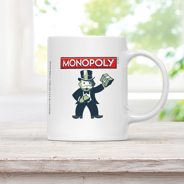 A Personalised standard mug with a blue handle and blue insides showcasing the official licensed personalizable Monopoly design.