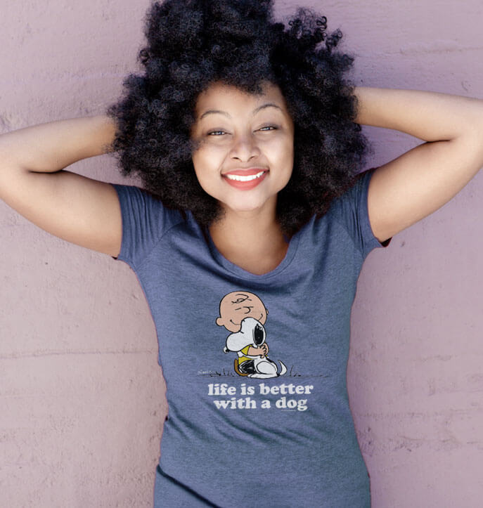 Young woman wearing a purple t-shirt printed with a custom design.