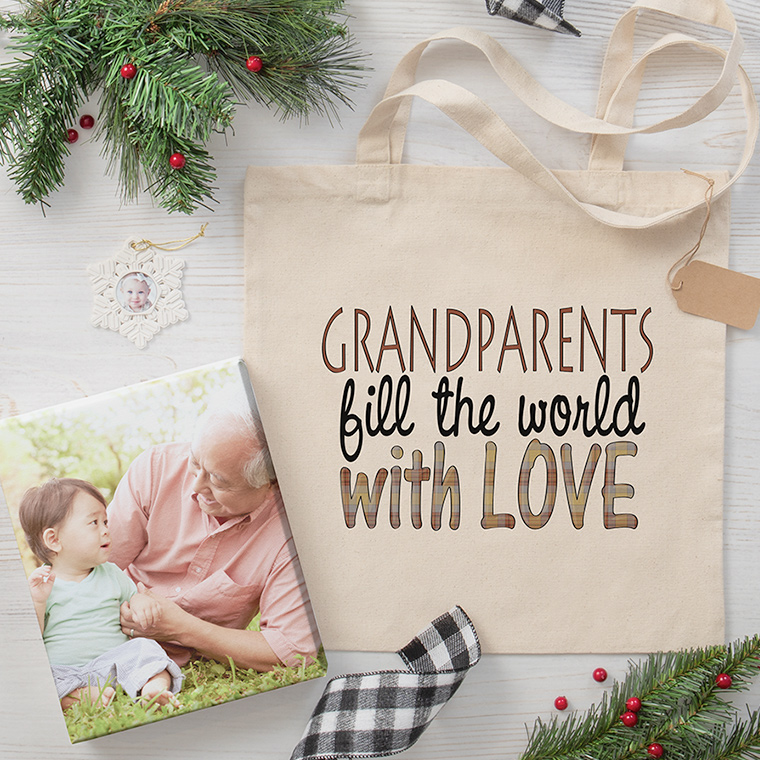 Grandparent gift ideas featuring tote bag with Grandparents Fill the World with Love design, canvas print with image of Grandpa and Grandson, and ornament with baby picture.