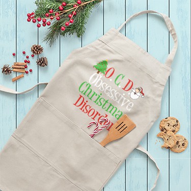 Christmas apron with OCD Obsessive Christmas Disorder funny text design.