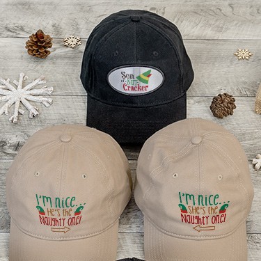 Three custom printed Christmas holiday hats in black, tan, and white.