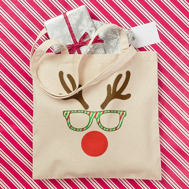 Custom printed Christmas holiday tote bag with Rudolf the Red Nosed Reindeer face design.